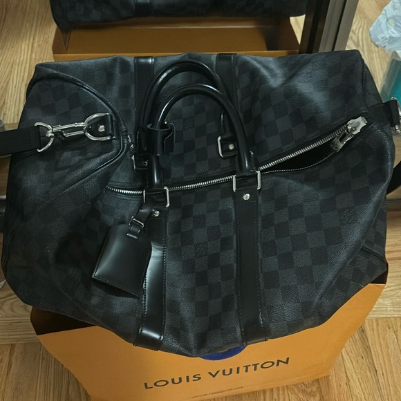 Black Louis Vuitton duffle bag - Picture 1 of 6